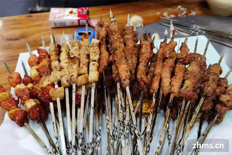 我朋友想尝试开个烧烤店，烧烤加盟店费用5万元够不够？